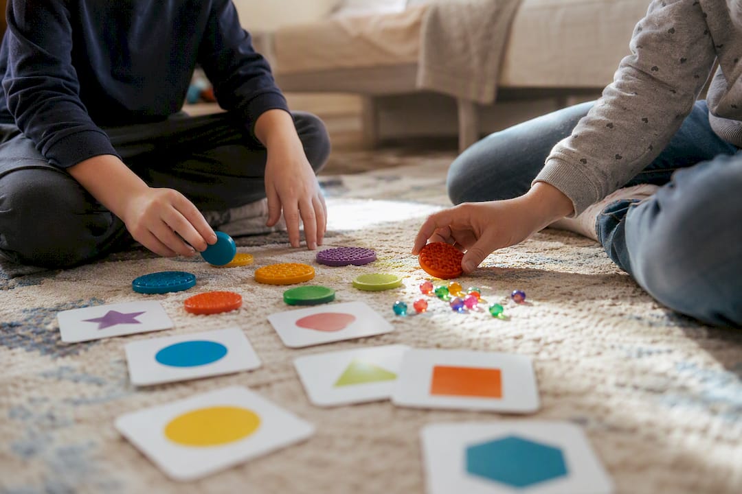Hands manipulating cognitive assessment tools