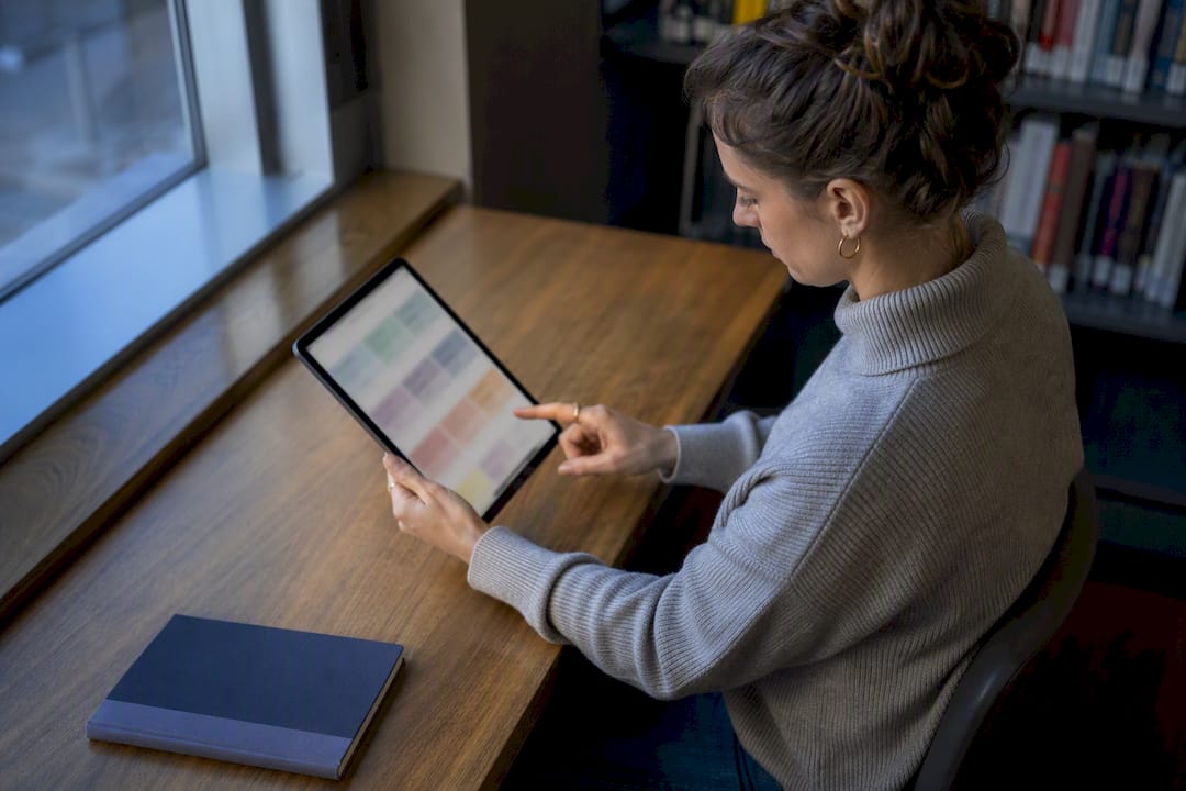 Adult reviewing a strengths profile on tablet